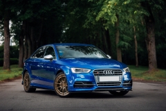 Riga, LV - JUN 11, 2020: New Audi S3 sedan at the trees alley